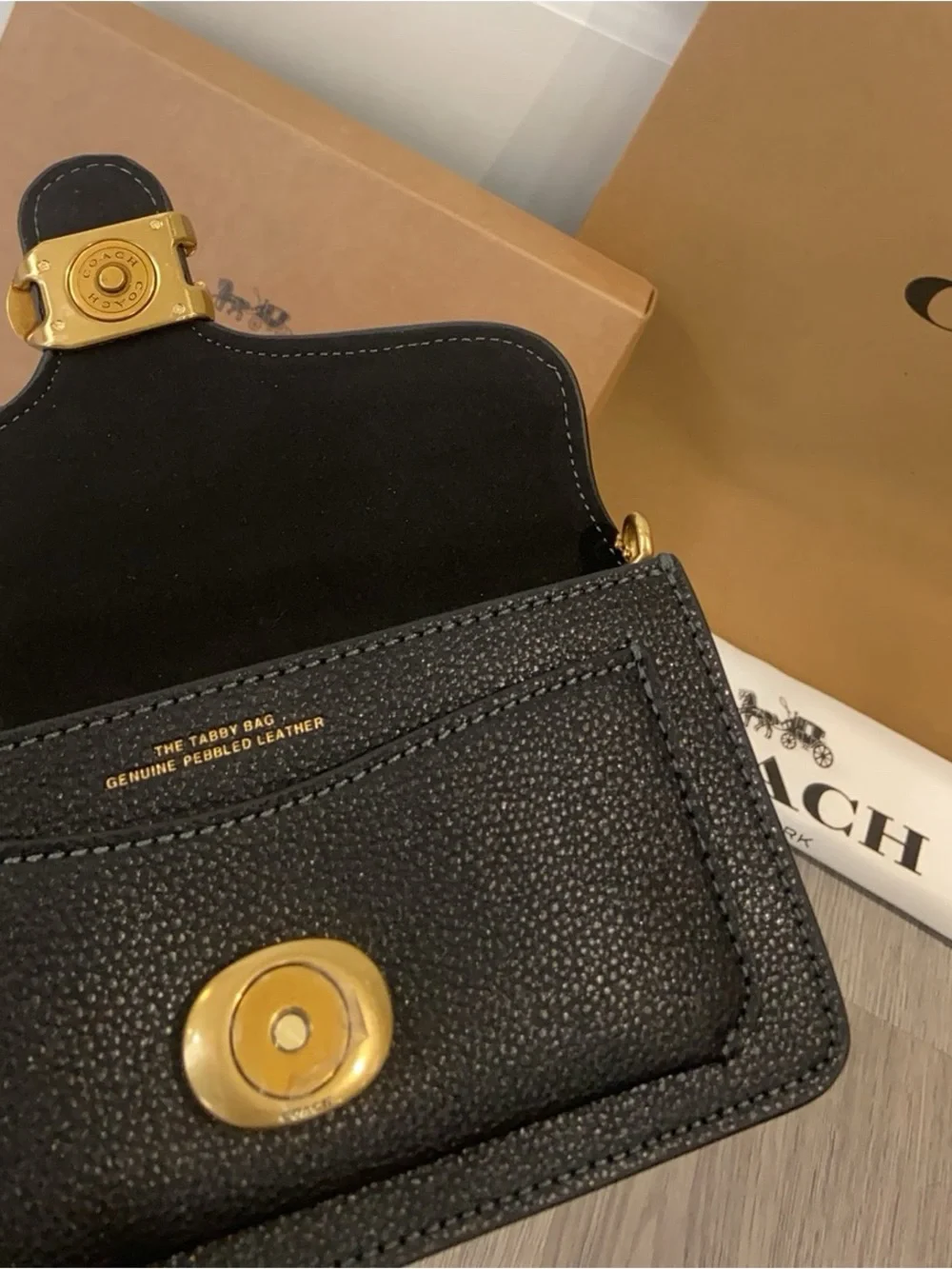 Coach Black Leather Crossbody with Gold 'C' Hardware and Chain Strap